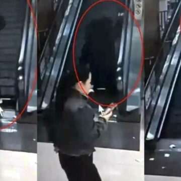 img-976 Femeie prinsă de o scară rulantă în China