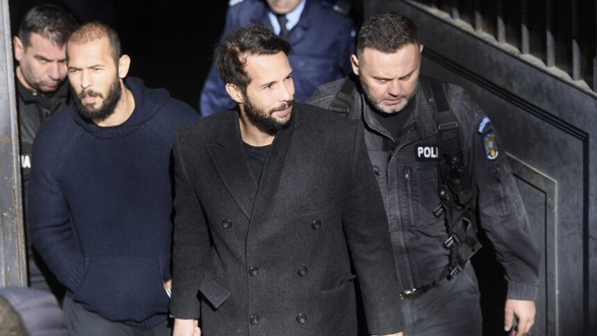 img Frații Tate, acuzați de trafic de persoane și spălare de bani